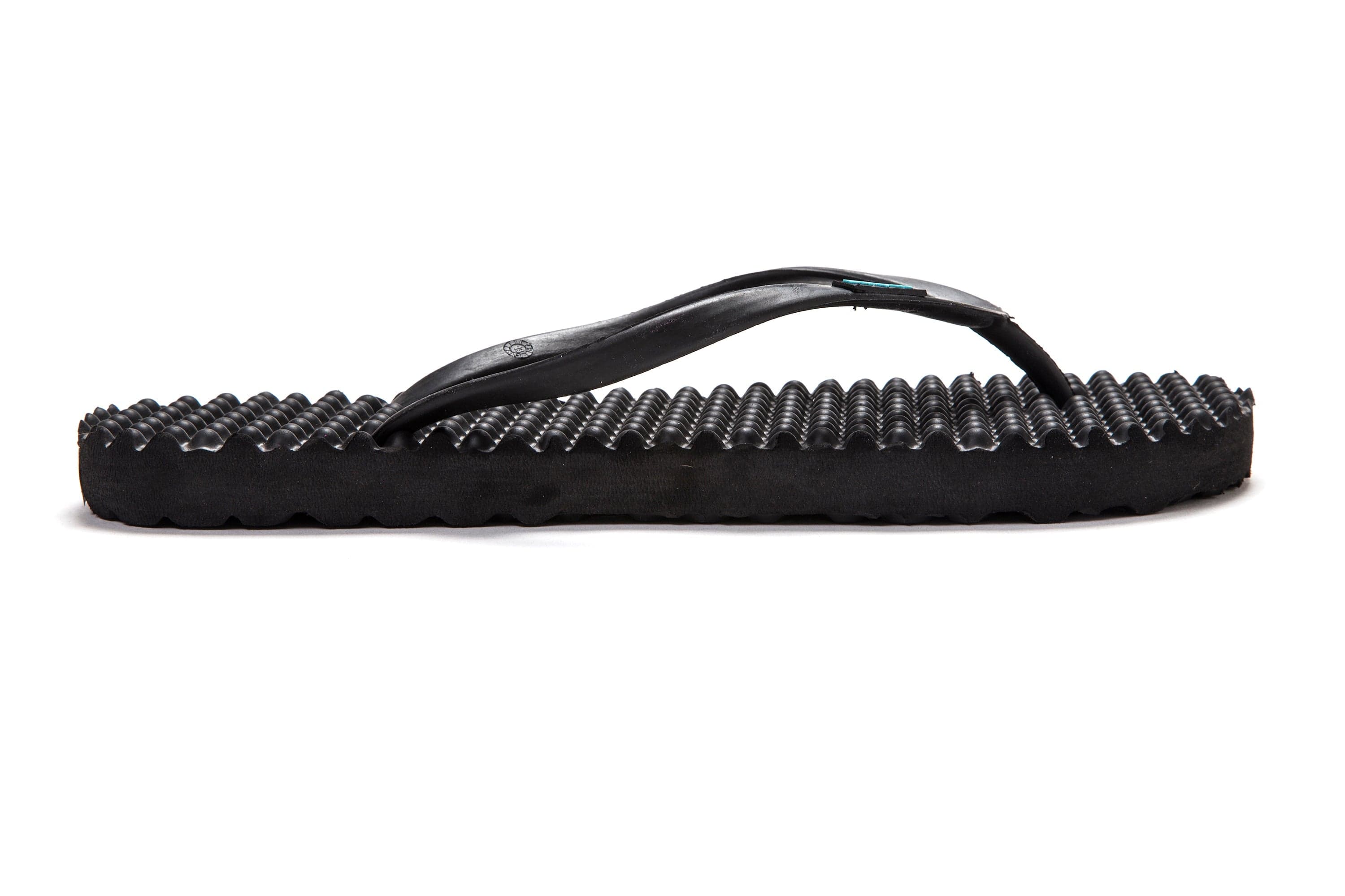 Side profile of a black Bumpers Slim sandal showing the complete strap, footbed, and sole