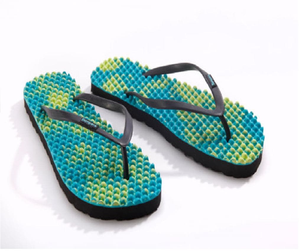 Pair of green and turquoise Bumpers textured sandals shown completely
