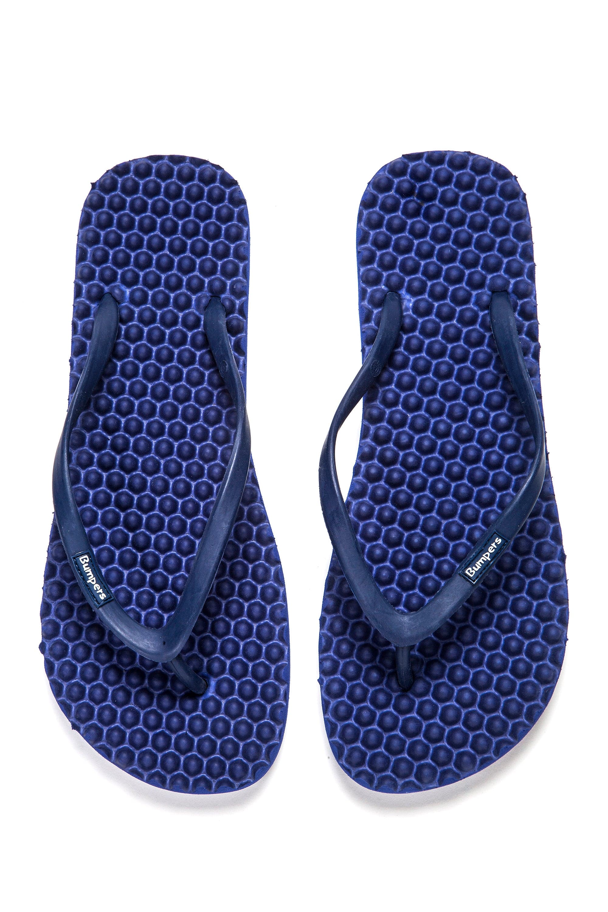 Pair of navy Bumpers Slim sandals photographed completely from above